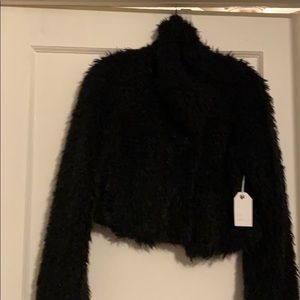 Gorgeous black  furry jacket! A must have !